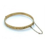 9K Yellow Gold Bangle with full hallmark inside band, weight 11.7g and 62mm diameter approx