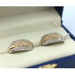 Pair of 18K White and Yellow Gold Earrings Encrusted Diamonds, weight 6.4g approx