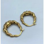 Pair of 9CT Yellow Gold Earrings, weight 1.6g and 2cm long approx