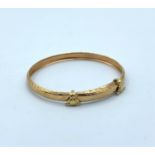 9CT Yellow Gold Baby Bangle with Teddy Bears decoration, 45mm diameter and weight 2.5g approx