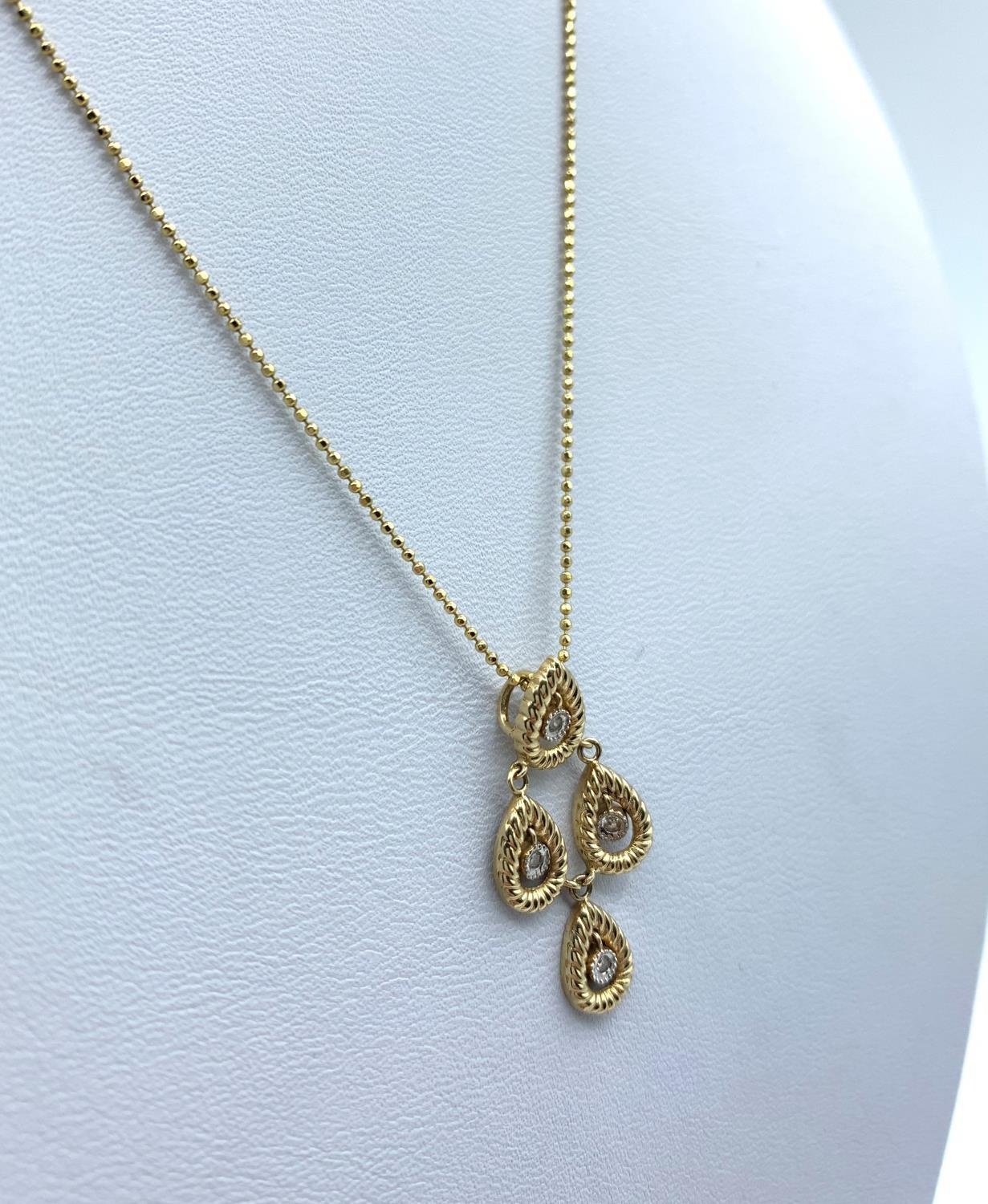 Diamond Drop Pendant in 18K Gold on a 9K Gold Chain, weight 3.1g and 36cm long chain - Image 2 of 4