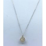 Diamond Cluster Floral Pendant in 18K Gold on a 9ct Gold Chain, weight 1.7g