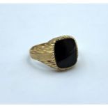 9CT Yellow Gold Gent Ring with square black stone centre, size Q and weight 3.2g approx