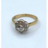 9ct yellow gold ring with 0.5ct diamonds in floral design, weight 2.4g and size J