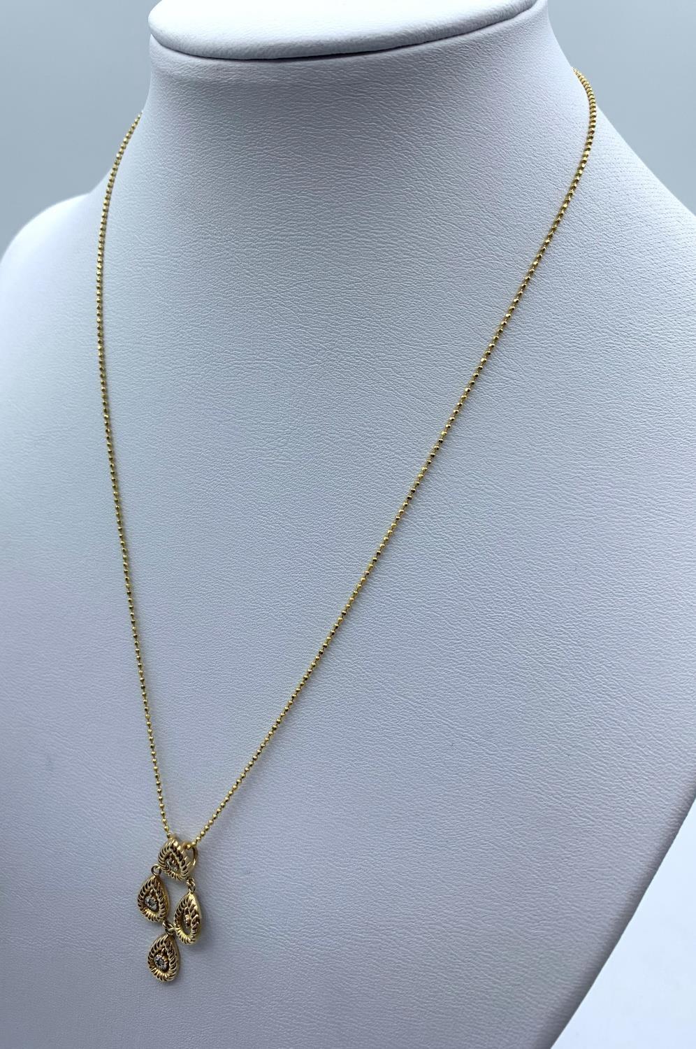 Diamond Drop Pendant in 18K Gold on a 9K Gold Chain, weight 3.1g and 36cm long chain - Image 3 of 4