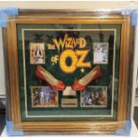 Authentic Hand Signed Piece of Cinematic history, a framed tribute to 'The Wizard of OZ' including