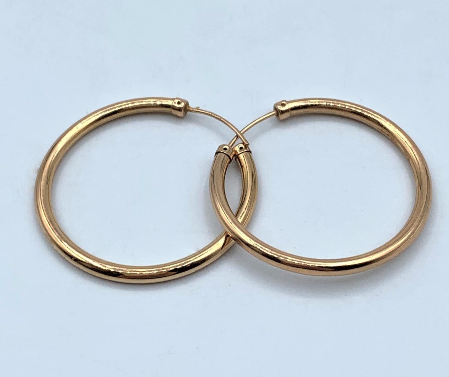 Pair of 9CT Rose Gold Hoop Earrings, 3cm diameter and 1.7g weight approx