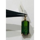 Large Green Tourmaline Pendant set in 10k yellow Gold, weight 2.6g and size L15mm x W8mm (ecn388)