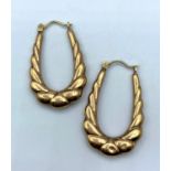 Pair of Yellow Metal horseshoe shaped Earrings, weight 1.6g and 3cm long approx