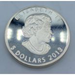 Pure Silver Canadian Five Dollar Coin 2013, one ounce of 9999 Silver having Maple Leaf and Queen