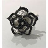 Silver floral Ring with black and white CZ stones, size P and weight 19.7g (ECN373)