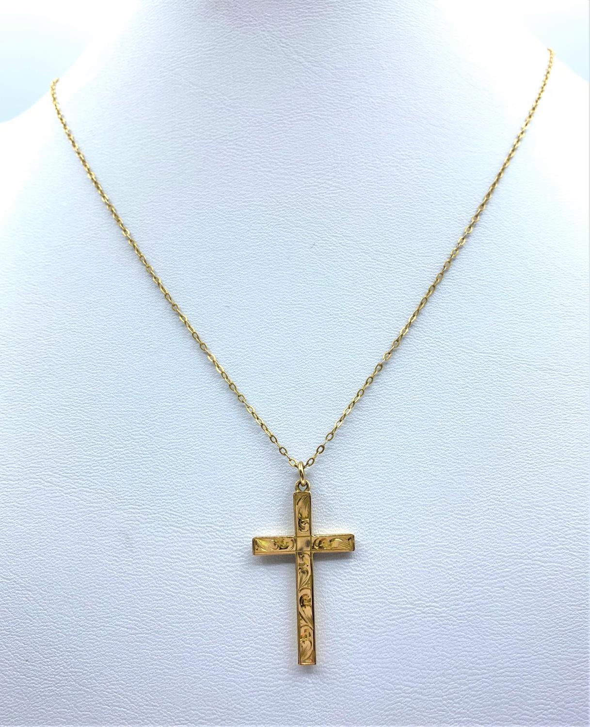 9CT Yellow Gold Crucifix Pendant set in 9ct 44cm long Chain, total weight 2g approx