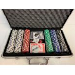300 Chip Poker set to include 300 chips, 2 packs of cards (unopened) 5 dice and a dealer badge in