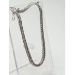 Silver stone set Tennis Bracelet, having 80 Zirconia and 925 marking for silver, 19cm long approx