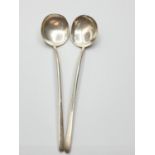 Pair of Silver slim handle round bowl sugar Spoons made in Chester 1923, weight 21.5g length 12.