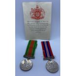 1935-45 Service Medal and a 1939-45 Defence Medal with Ribbons and Original Printed note from the