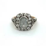 Antique Diamond Ring with Rose cut centre stone and round brilliant cut surrounded diamonds, over