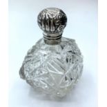 Antique Silver topped cut glass Scent Bottle, having a clear hallmark for Birmingham 1893, hinged