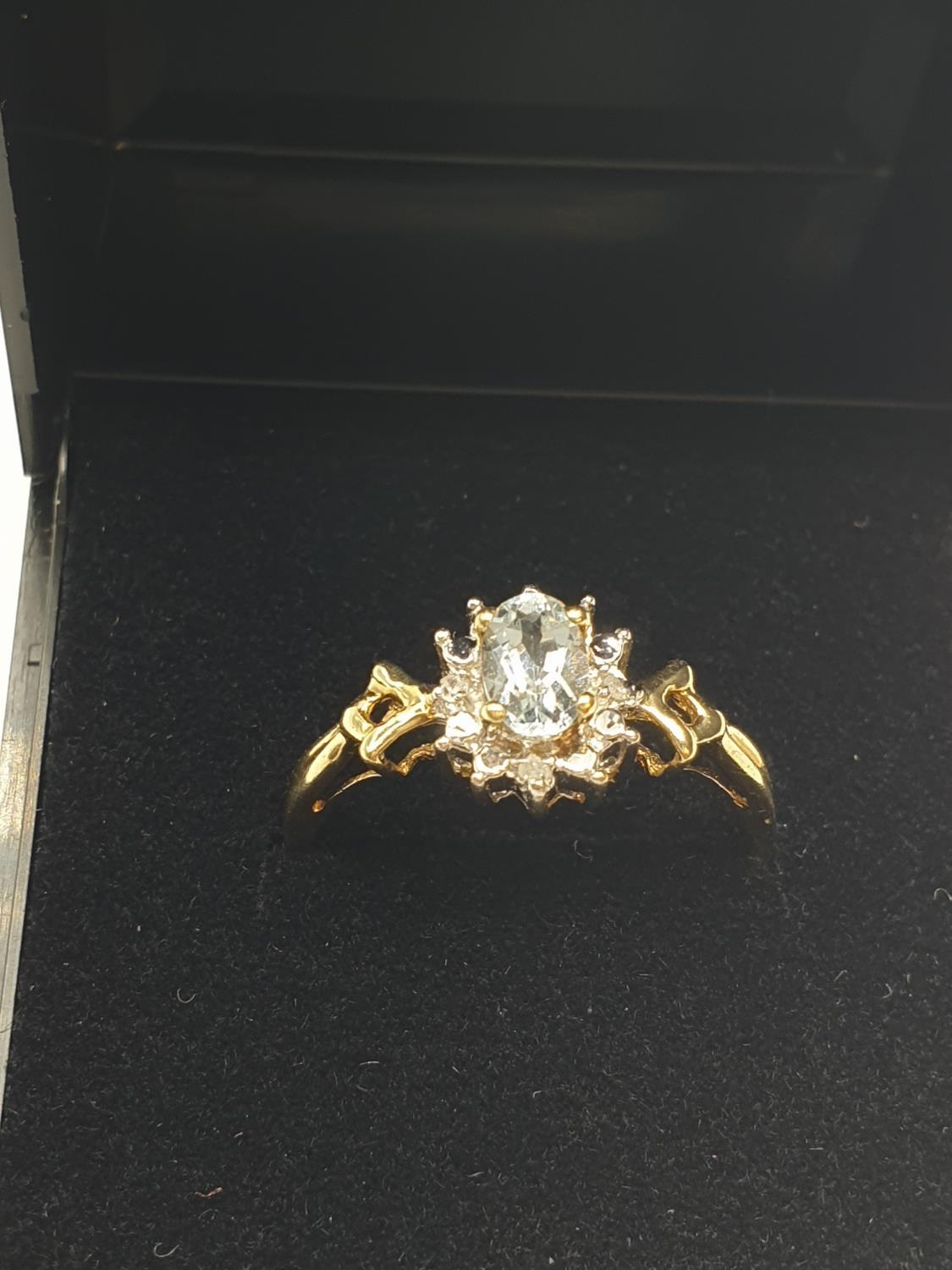 Stone set 9ct Yellow gold Ring having an oval Topaz to centre of mount with a surround of small - Image 3 of 8