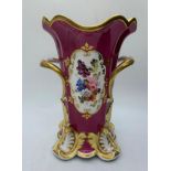 H&R Daniel four footed maroon glaze Vase with floral theme, in good condition 18cm tall