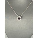 18K White Gold Pendant with 1ct Black Diamond centre and 0.16ct white diamonds surrounds, set on 18k