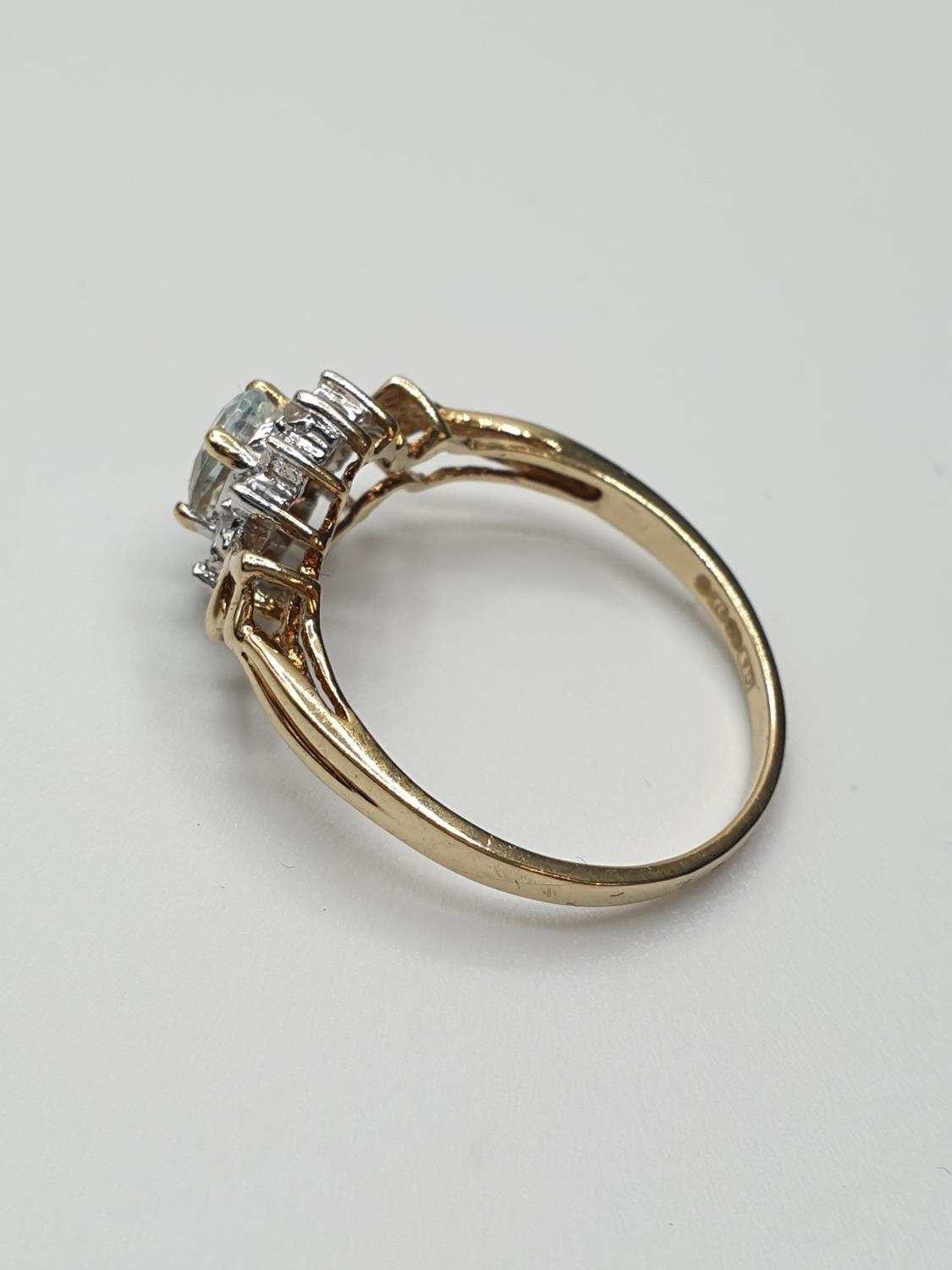 Stone set 9ct Yellow gold Ring having an oval Topaz to centre of mount with a surround of small - Image 6 of 8