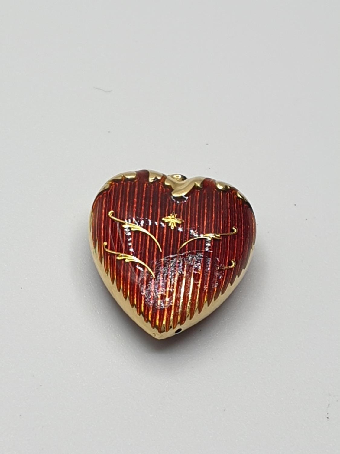 A Rare Faberge Limited Edition Gold and Red Guilloche Enamel heart Pendant, clear marking for