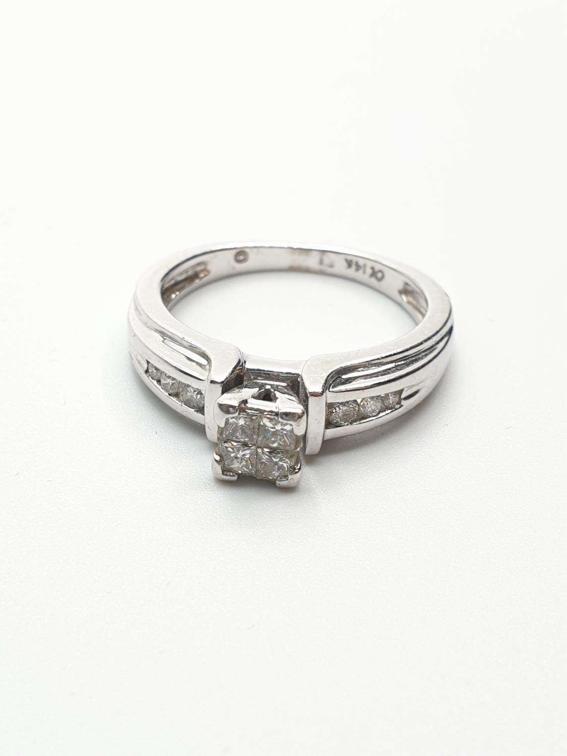 14ct White Gold Diamond Cluster Ring with approx 0.20ct diamonds, weight 4.1g and size L1/2