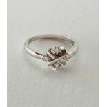 9K White Gold Ring with 0.20cts Diamonds, weight 2.9g and size N (ecn700)