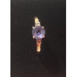 Hallmarked 9ct Gold Ring with a Tanzanite coloured stone.Size O.