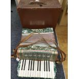 A Vintage 'Rosetts' Accordian, Bellows in good working order but one key needs a new spring, comes