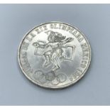 Silver 25 Peso Coin from the Mexico Olympics 1968, uncirculated and good condition, still having