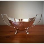 Vintage twin handled Silver Sugar Bowl, having patterned engraving to upper border, standing on four