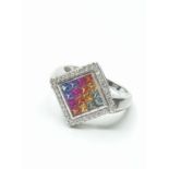 Stone set 9ct White Gold Ring having various coloured gemstones to top of the mount with a diamond