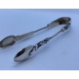 Antique Silver Pair of Apostle Sugar Tongs. Rare Design Having Relief Figure Work to Outer With