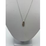 9ct Diamond Pendant & Chain, 1.2g, 44cms.