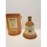 Bells Scotch Whisky Decanter by WADE in original cylindrical carton , 22x16cm