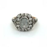 Antique Diamond Ring with Rose cut centre stone and round brilliant cut surround of diamonds, over