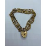 9ct Gold Watch Chain transformed into a Bracelet with Heart padlock, weight 28.7g and 16cm long