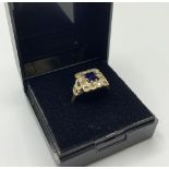 9CT Gold Ring stone set with square Sapphire to centre and a 10 Zirconia surround, 3.3g approx and