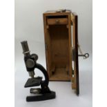 Vintage microscope in wooden box with lock & key, 26x10cms
