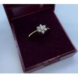 9ct Gold Stone Set Ring Having Diamonds Arranged in a Flower Setting. Full Hallmark, Size O.