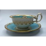 H&R Daniel second gadroon shaped cup & saucer with unusual dragon decoration some fading to lustre