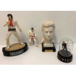 A collection of Elvis Memorabilia to include a bust and a model of Elvis in his full Vegas gear