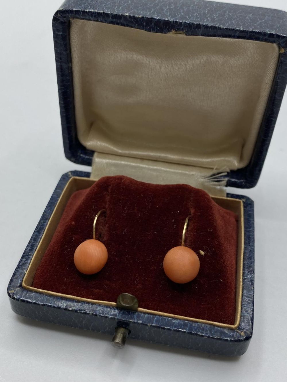 A 19th Century pair of 18ct gold earrings with natural (untreated) pink coral in original