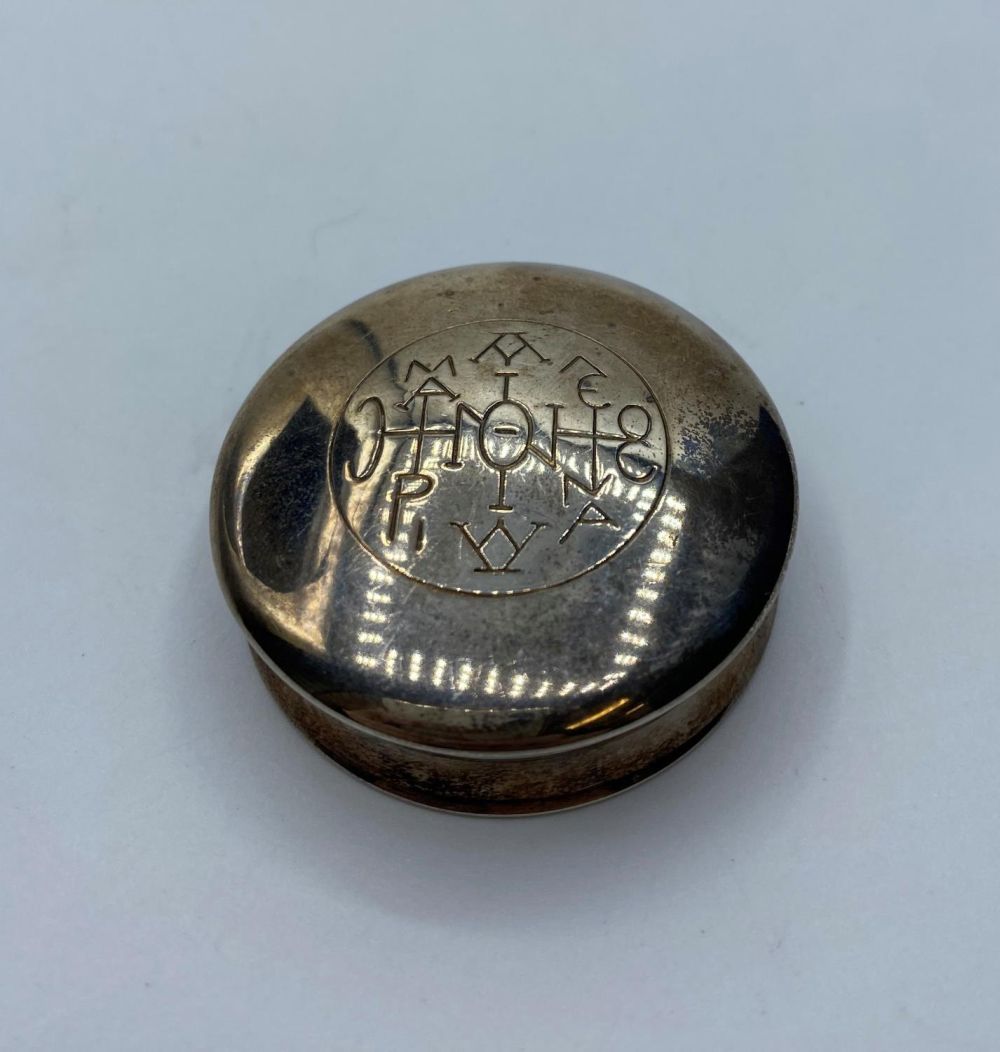 A Greek silver and internally gilded box (pill box?) 48x48x18mm, with a mystic message in Greek