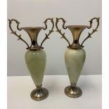 Pair of onyx urns, could be used as lamps. 37cms tall and weighs 5.2 kilos