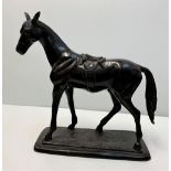 Bronze figure of a saddled horse by unknown artist, 32cm and 4.5kg