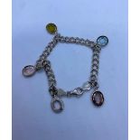 Unusual Silver Charm Bracelet with small Cameo as charms, weight 11g and 16cm long approx