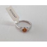 18k White Gold Ring with Citrine centre and Diamond shoulders (0.50ct top quality), weight 4.05g and